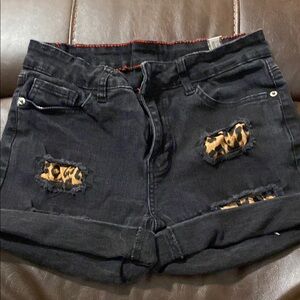 Stylish Black Denim Shorts with Leopard Accents
